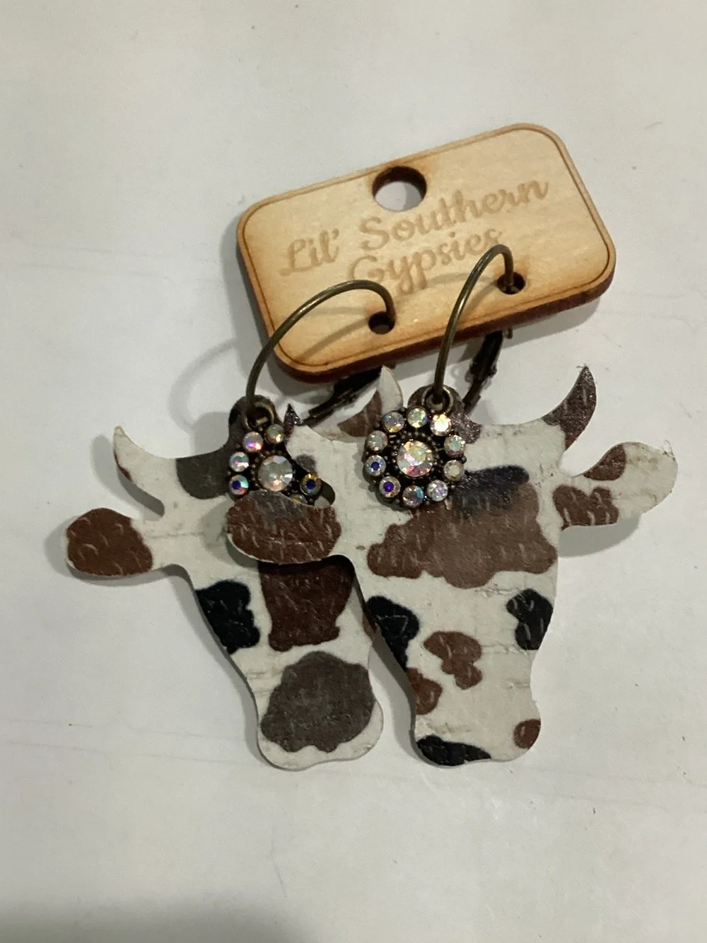 Lil' Southern Gypsies Cowhide Cow Head Earrings - White, Brown, Black